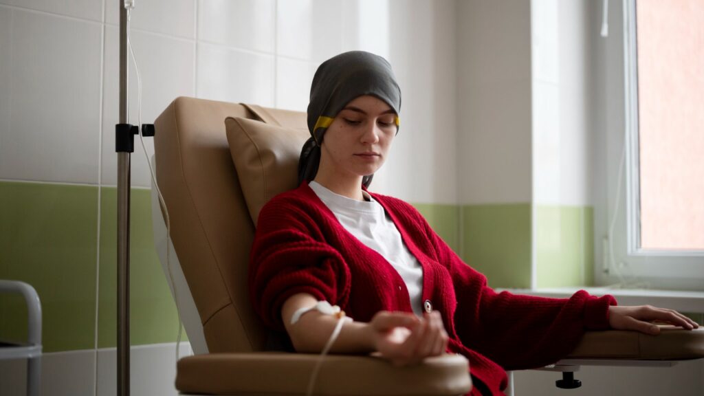 Leukemia Treatment in Thrissur Kerala showing a patient receiving IV therapy in a hospital setting